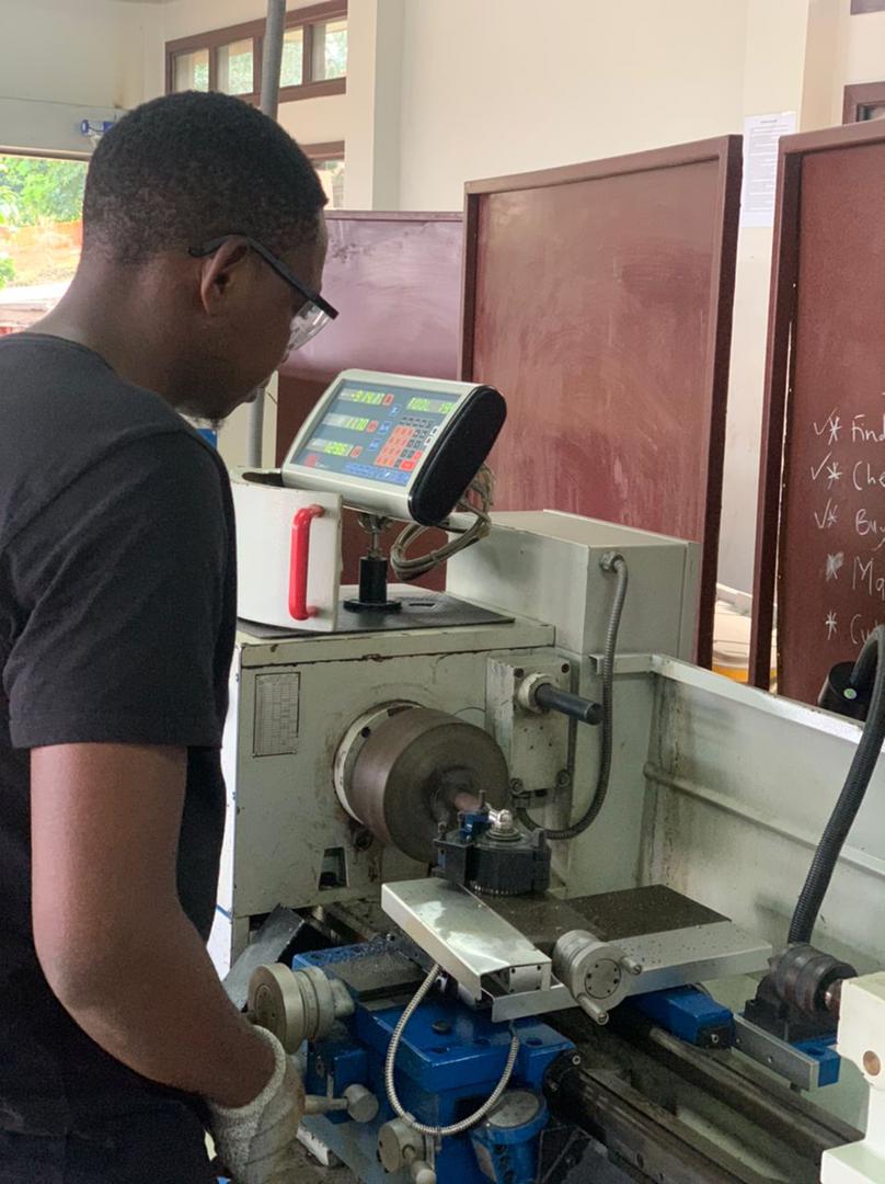 Ernest working on Lathe Machine